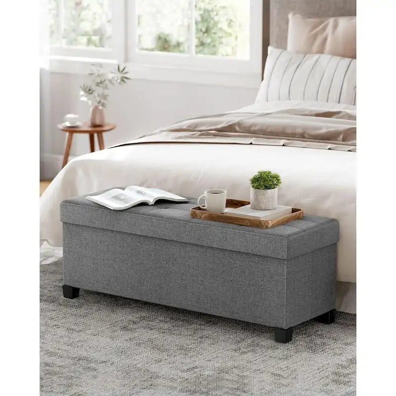 Ottoman de rangement rembourré en tissu de 109 cm de large avec pieds en bois et couvercle capitonné