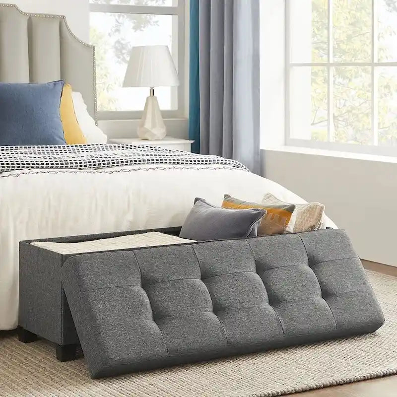 Ottoman de rangement rembourré en tissu de 109 cm de large avec pieds en bois et couvercle capitonné
